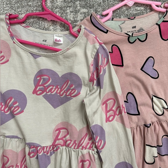 Two H&M girls printed long sleeve dresses a Barbie and hearts - Picture 2 of 4